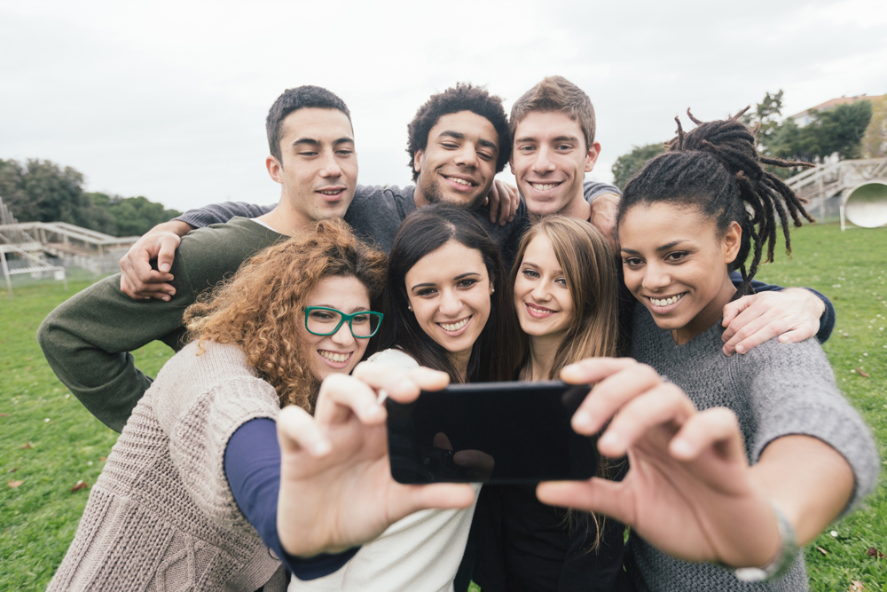 millennials taking a selfie